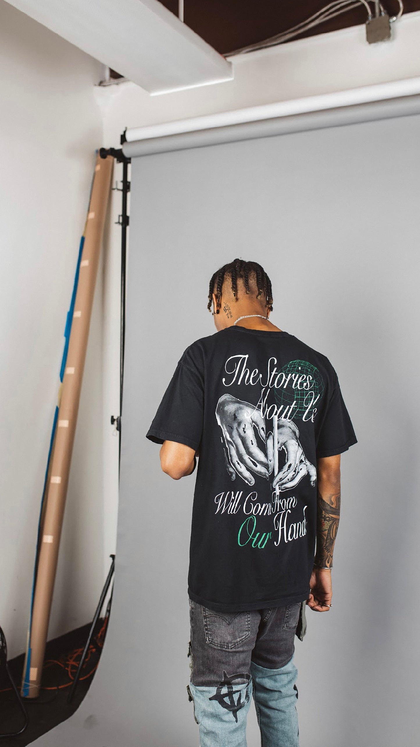 “From Our Hands” Tee Shirt (black//green)